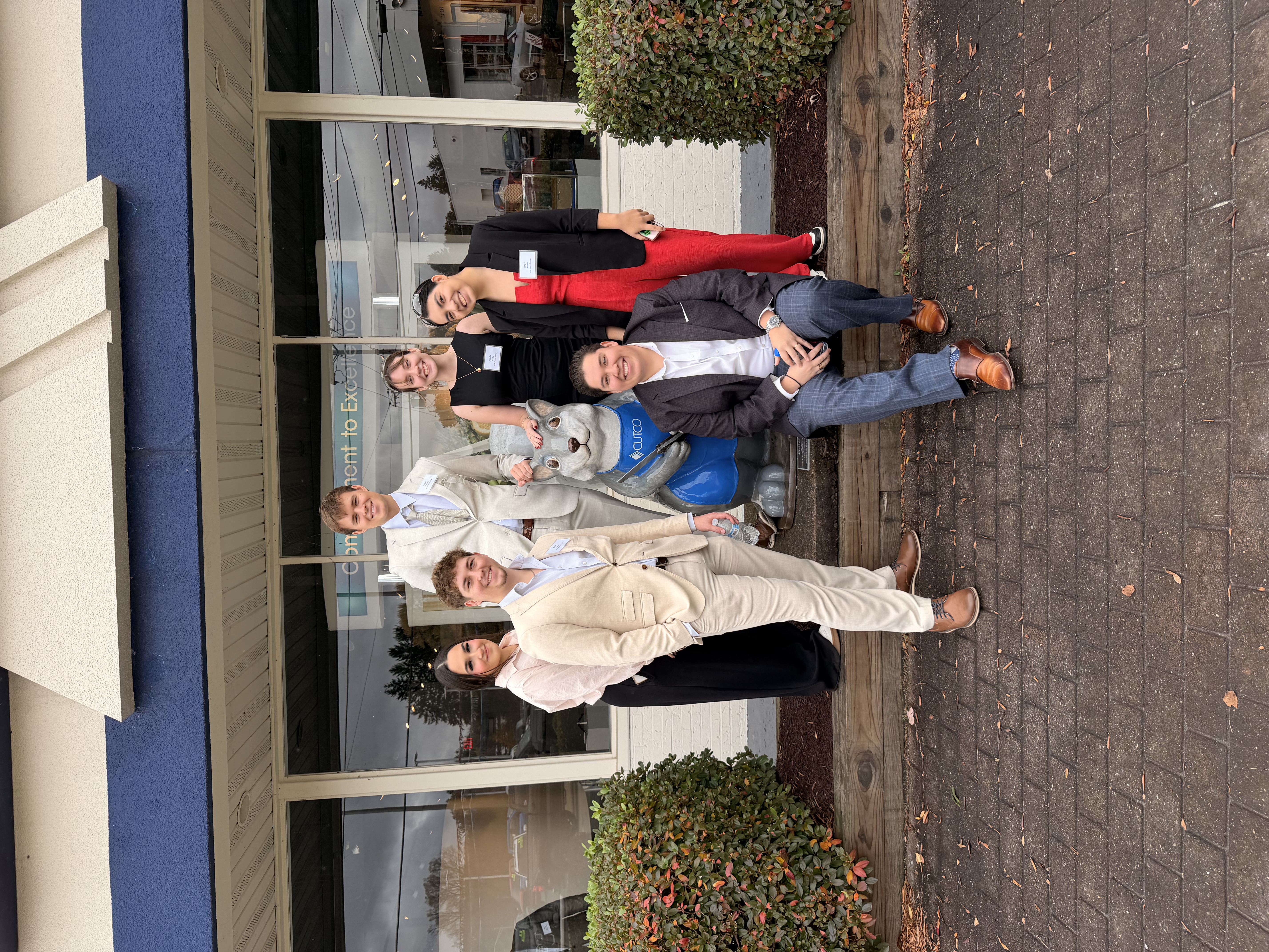 Team at Cutco headquarters with mascot